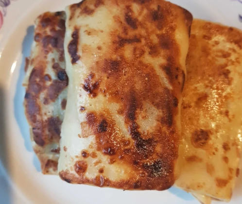 Plānās pankūkas pildītas ar gaļu